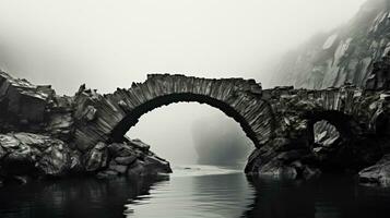 antiguo Roca puente en minimalista negro y blanco antecedentes con vacío espacio para texto foto