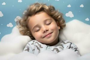 A child peacefully sleeping on a cloud isolated on a white background photo