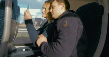 Timelapse of couple making selfie with pad in train video