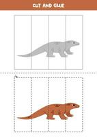 Cut and glue game for kids. Cute cartoon monitor lizard. vector