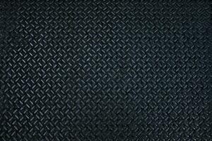 Black Metal Diamond Plate Texture Background. photo