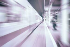 Abstract White Motion Blurred Train in Japan. photo