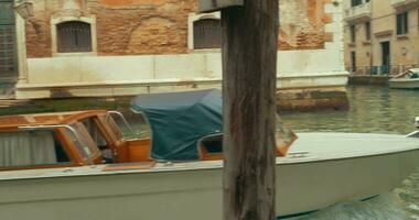 Touristic boats sailing on canal of Venice video