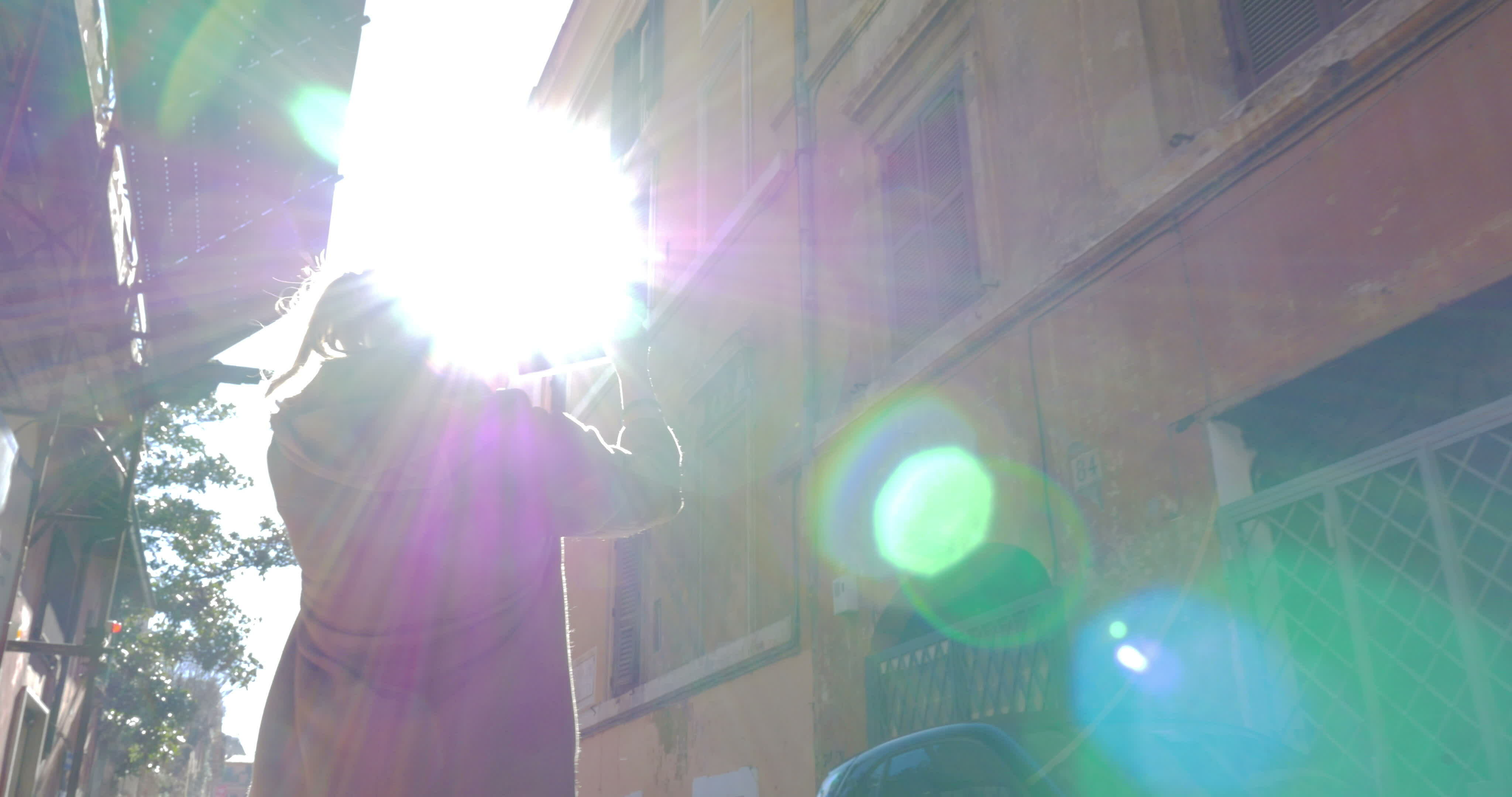 Woman with pad walking outdoor on sunny day 29205153 Stock Video at