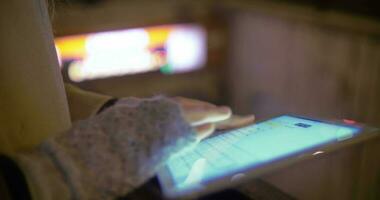 Female hands working with touch pad by metro entrance video