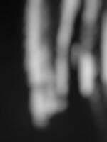 A black background with a white background,abstract black background.black background illustration texture and dark gray charcoal paint, dark and gray abstract wallpaper. photo