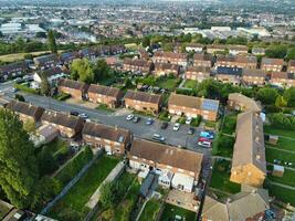 Aerial View of Residential Real Estate with Industrial Estate Combined District of North of Luton City of England, Great Britain, UK.  Footage Was Captured with Drone's Camera on September 7th, 2023 photo