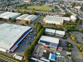 Aerial View of Residential Real Estate with Industrial Estate Combined District of North of Luton City of England, Great Britain, UK.  Footage Was Captured with Drone's Camera on September 7th, 2023 photo