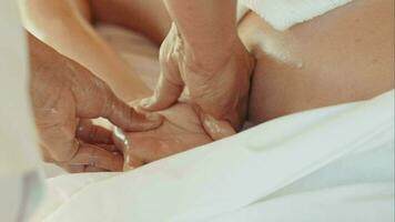 Massage of palm and fingers in beauty spa video