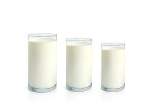 three glasses of milk isolated on white background photo