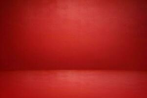 The floor and walls of the room are red as the background. photo