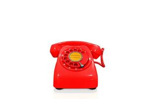 Red vintage telephone isolated on white background photo