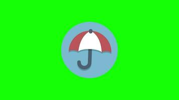 un parapluie est montré sur une vert Contexte video
