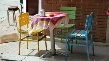 cafe interior design. Colorful blue and pink chairs and tables. video
