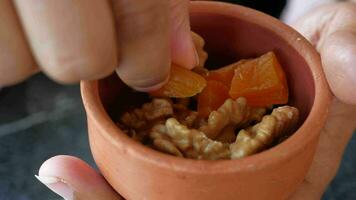 walnut on a plate on table , video