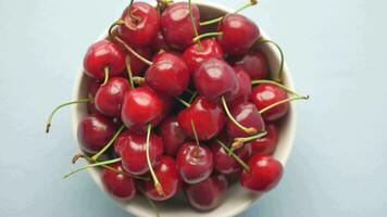 ripe fresh cherry on a white tray video