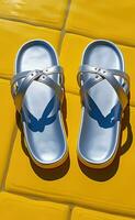 Flip flops on terrace on a pool photo