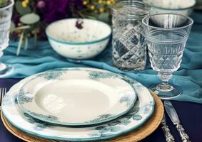 Formal holiday tablescape with blue decor, dinner table setting, table scape with elegant tableware and dinnerware for wedding party and event, generative ai photo