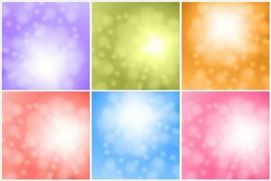 Set of abstract colorful backgrounds with bokeh effect. vector