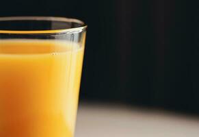 Glass of orange juice, healthy drink photo