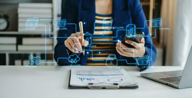 Blockchain financial technology to secure cryptocurrencies for online payment and digital transaction. Fintech concept. Man working on laptop computer, smartphone and tablet. with virtual icon photo