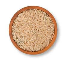 Brown rice isolated on white background. Top view. photo