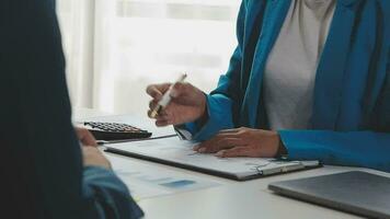 Team of business people working together in the meeting room office, teamwork background charts and graphs banner, double exposure successful teamwork,business planning concept. video
