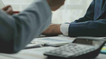 Team of business people working together in the meeting room office, teamwork background charts and graphs banner, double exposure successful teamwork,business planning concept. video