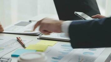 Team of business people working together in the meeting room office, teamwork background charts and graphs banner, double exposure successful teamwork,business planning concept. video