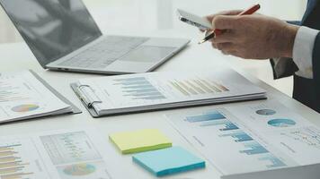Team of business people working together in the meeting room office, teamwork background charts and graphs banner, double exposure successful teamwork,business planning concept. video