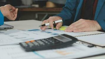 Team of business people working together in the meeting room office, teamwork background charts and graphs banner, double exposure successful teamwork,business planning concept. video