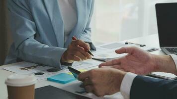 Team of business people working together in the meeting room office, teamwork background charts and graphs banner, double exposure successful teamwork,business planning concept. video