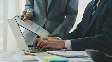 Team of business people working together in the meeting room office, teamwork background charts and graphs banner, double exposure successful teamwork,business planning concept. video