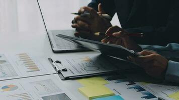 Team of business people working together in the meeting room office, teamwork background charts and graphs banner, double exposure successful teamwork,business planning concept. video