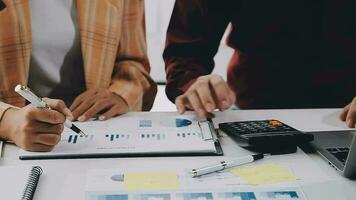 Team of business people working together in the meeting room office, teamwork background charts and graphs banner, double exposure successful teamwork,business planning concept. video
