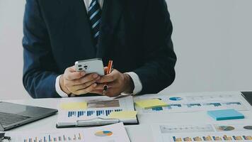 Team of business people working together in the meeting room office, teamwork background charts and graphs banner, double exposure successful teamwork,business planning concept. video