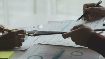 Close up of Business team analyzing income charts and graphs with modern laptop computer. Business analysis and strategy concept. video