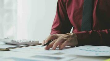 Close up of Business team analyzing income charts and graphs with modern laptop computer. Business analysis and strategy concept. video