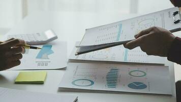 Close up of Business team analyzing income charts and graphs with modern laptop computer. Business analysis and strategy concept. video