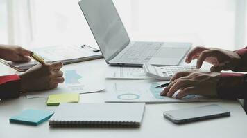 Close up of Business team analyzing income charts and graphs with modern laptop computer. Business analysis and strategy concept. video