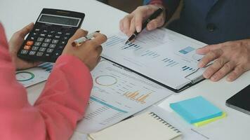 Close up of Business team analyzing income charts and graphs with modern laptop computer. Business analysis and strategy concept. video