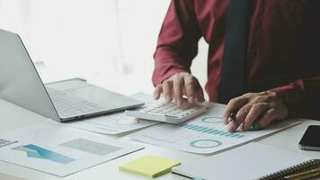Close up of Business team analyzing income charts and graphs with modern laptop computer. Business analysis and strategy concept. video