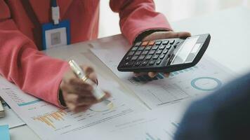 Close up of Business team analyzing income charts and graphs with modern laptop computer. Business analysis and strategy concept. video