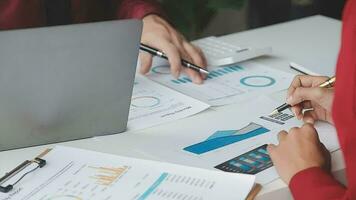 Close up of Business team analyzing income charts and graphs with modern laptop computer. Business analysis and strategy concept. video