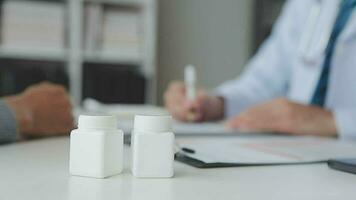 Doctor and patient are discussing consultation about symptom problem diagnosis of disease talk to the patient about medication and treatment method. video