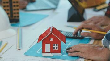 Construction and structure concept of Engineer or architect meeting for project working with partner and engineering tools on model building and blueprint in working site, contract for both companies. video