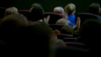 People applauding, handheld shot video