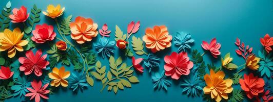 top view of colorful paper cut flowers with green leaves on blue background with copy space. AI generated photo