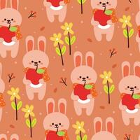 seamless pattern cartoon bunny holding an apple with leaves, flower and autumn vibes element. cute autumn wallpaper for holiday. design for fabric, flat design, gift wrap paper vector