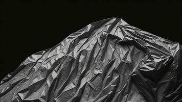 Wrinkled plastic wrap texture on a black background. AI generated photo